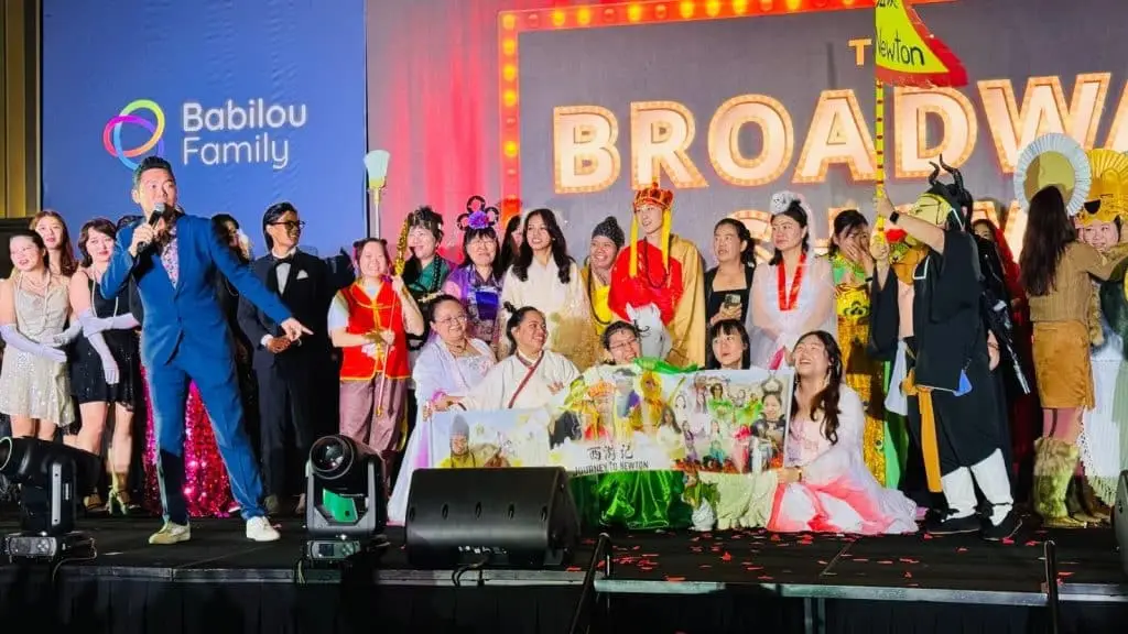 James Yang hosting a themed corporate show with performers
